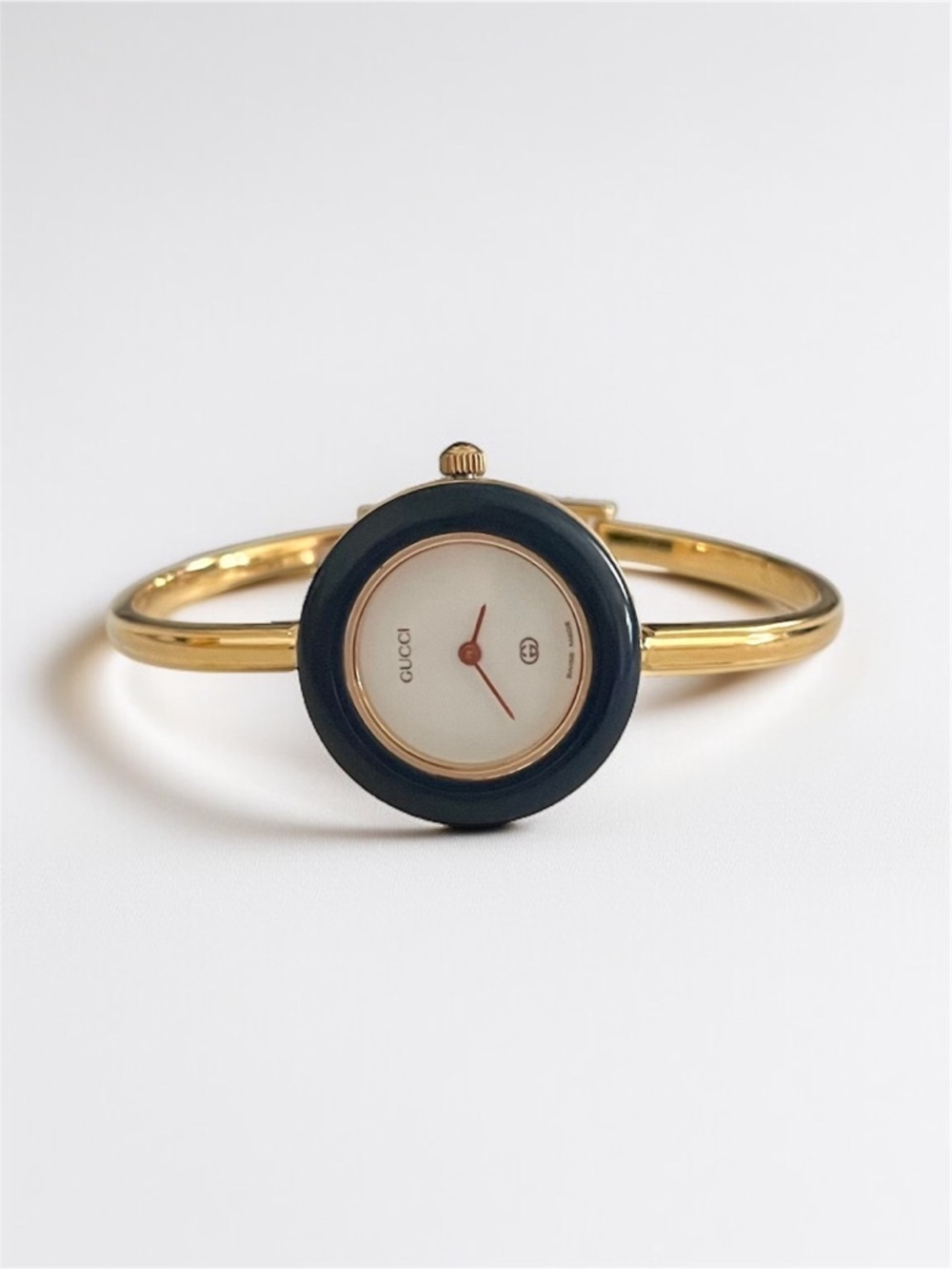 Gucci Gold Bangle Watch with Black Bezel and White Dial